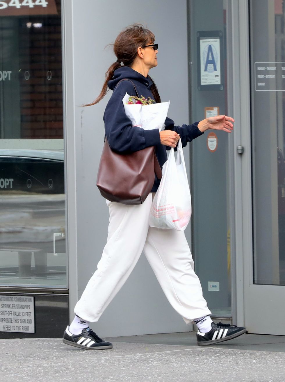 a person walking outside of a building