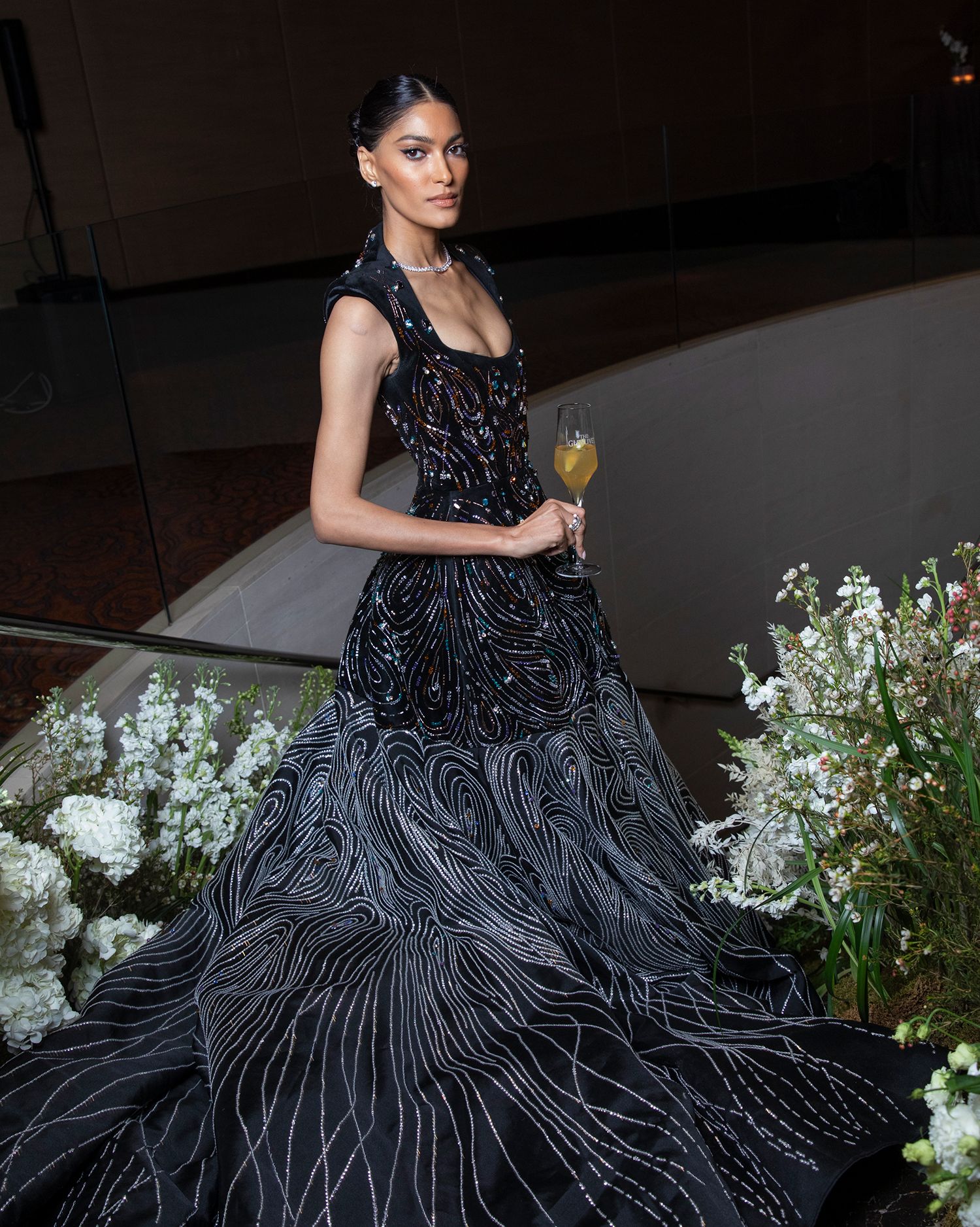 a woman in a black dress