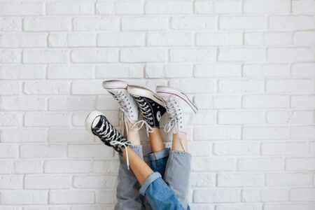 Why Orthopedic Sneakers Are Dominating Celebrity Street Style Clean white orthopedic sneakers on neutral background showing modern design and comfort features