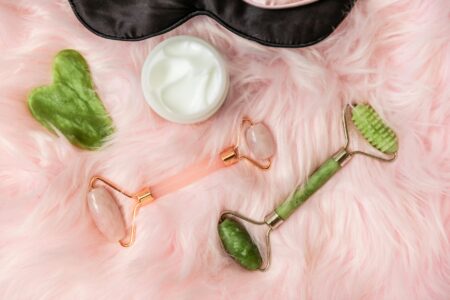 Why Micro-Needling Tools Are Replacing Jade Rollers for At-Home Skincare Various skincare tools and devices arranged on white background