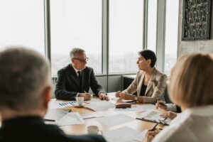Corporate executives in professional meeting discussing business strategy