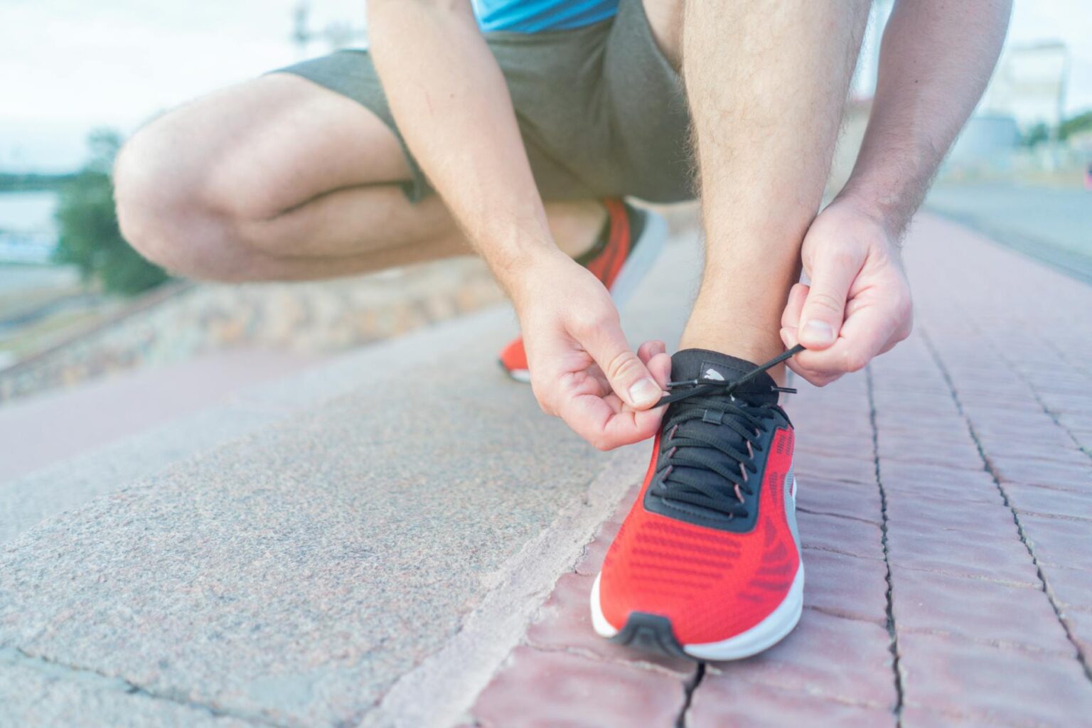 Close-up view of athletic running shoes showing insole and foot support technology
