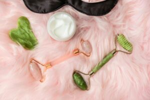 Professional beauty and skincare tools arranged on white surface