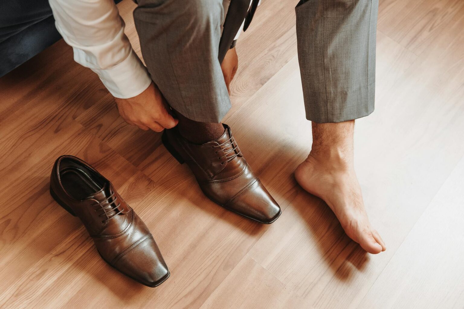Professional business shoes arranged on modern office floor