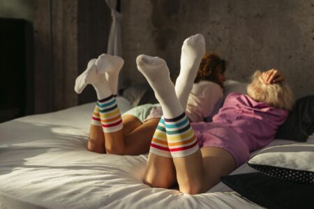 How Compression Socks Became Street Style’s Latest Statement Piece Display of various colorful compression socks showing different patterns and designs