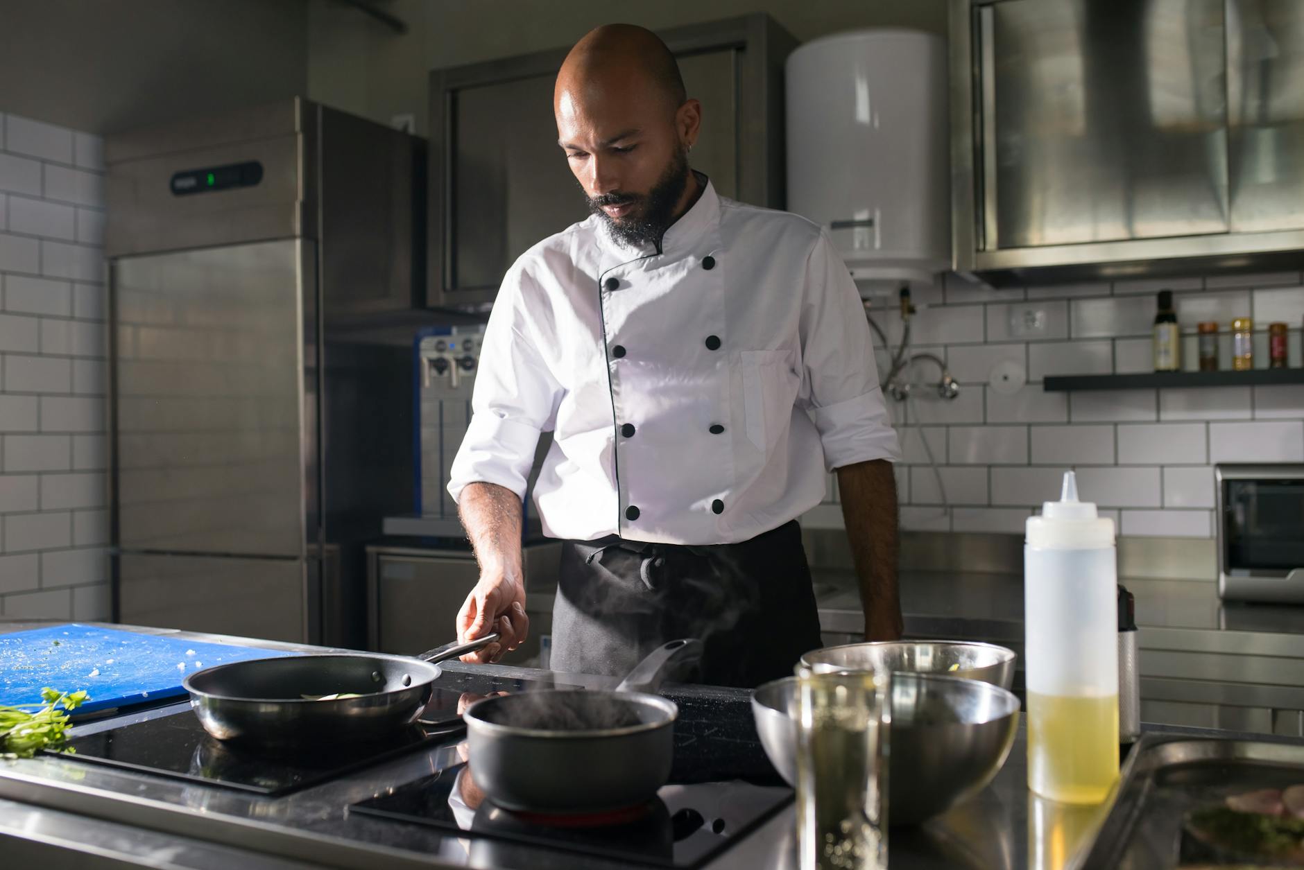 Professional chef preparing healthy meals in modern kitchen