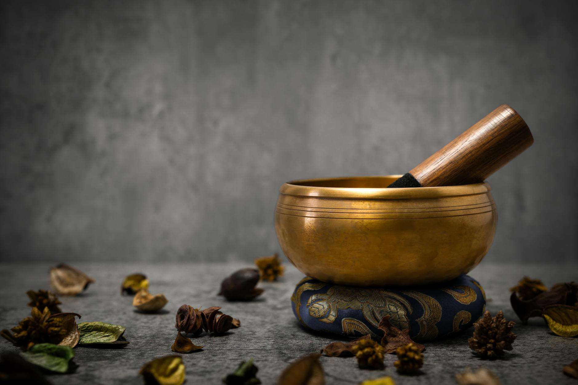 Close-up of crystal singing bowls used in sound bath meditation sessions