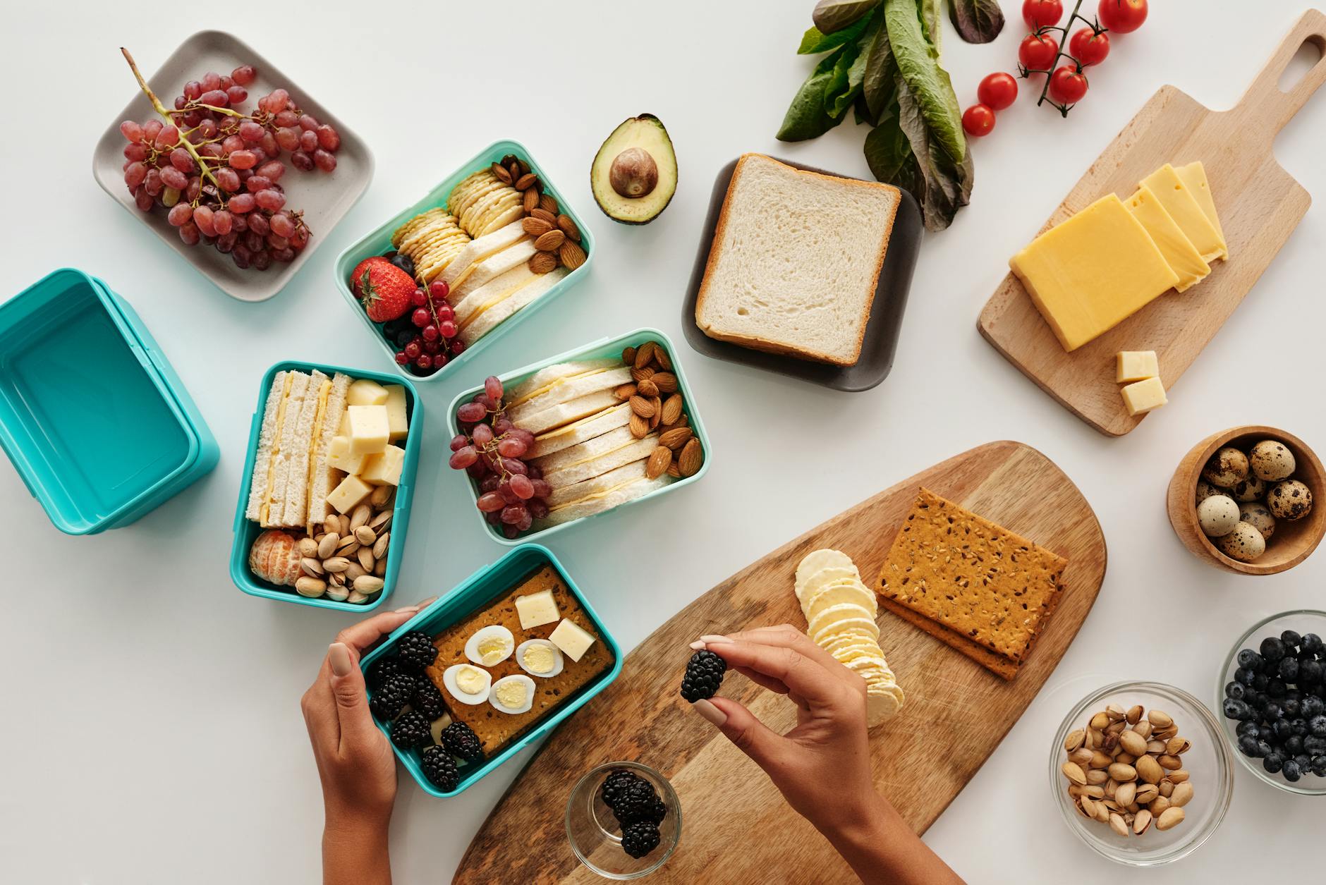 Organized glass containers filled with colorful prepared meals