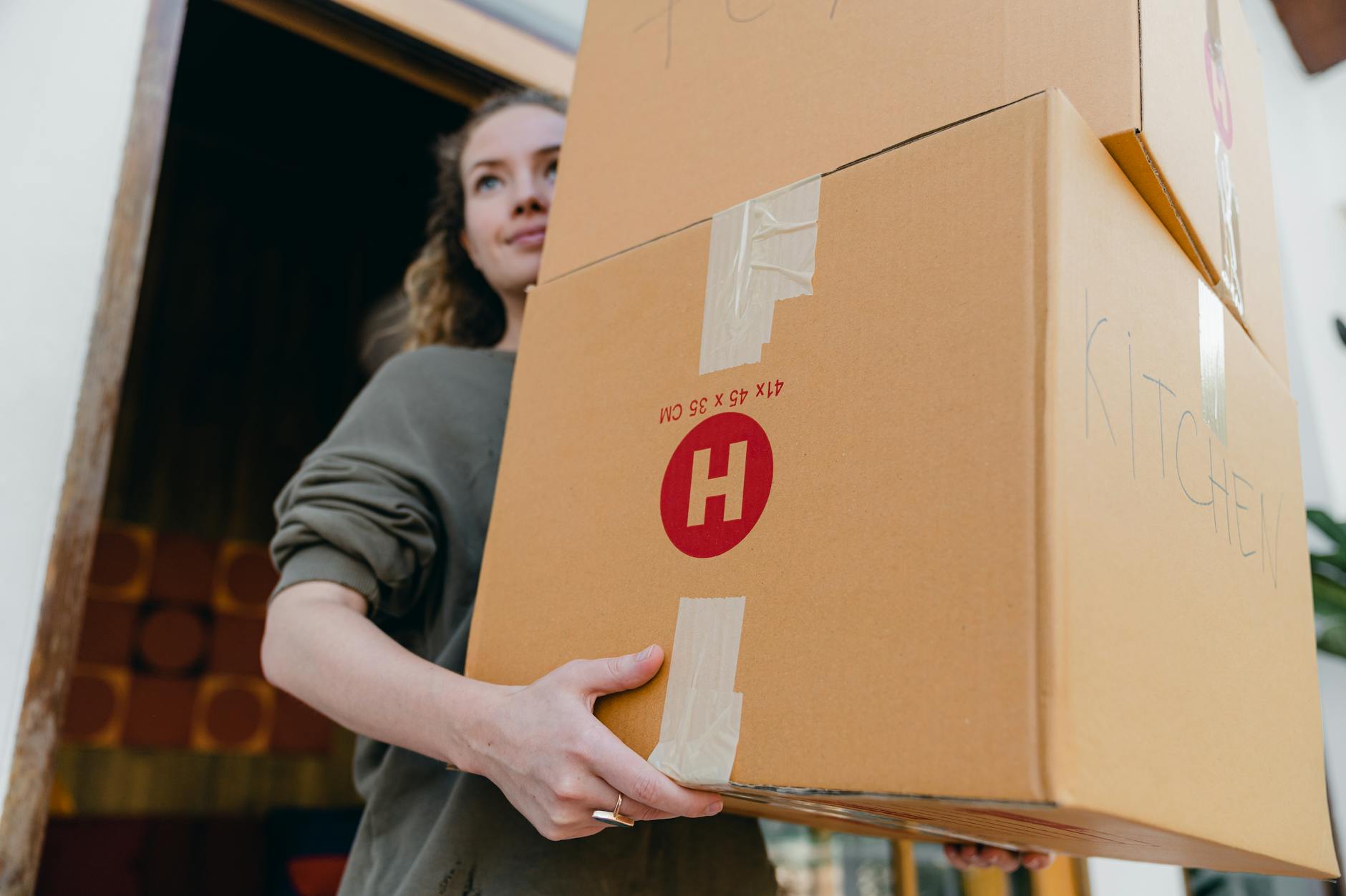 Neatly labeled boxes and organized items during a professional downsizing and decluttering process