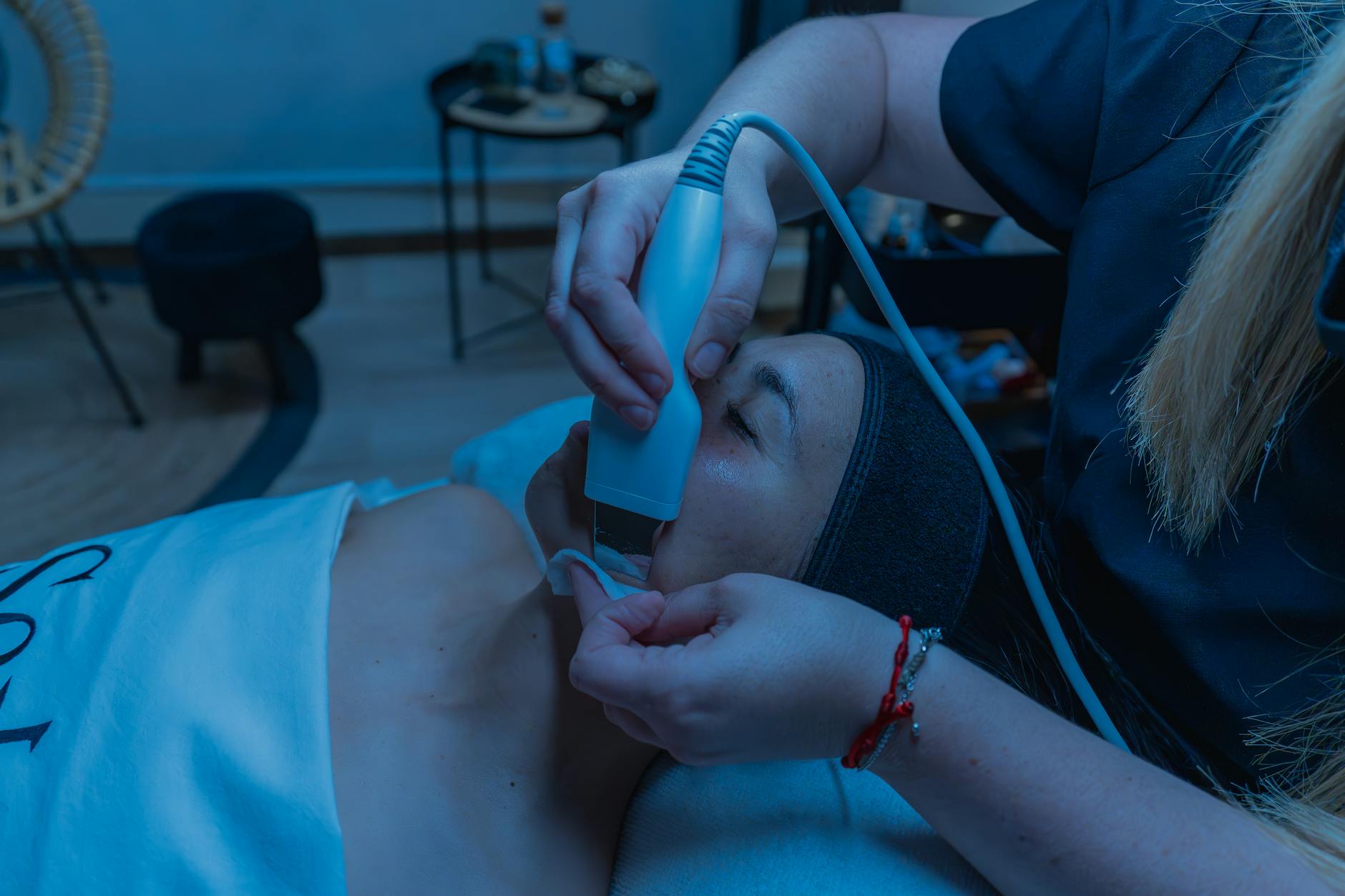 Professional ultrasonic skincare device used in spa treatments