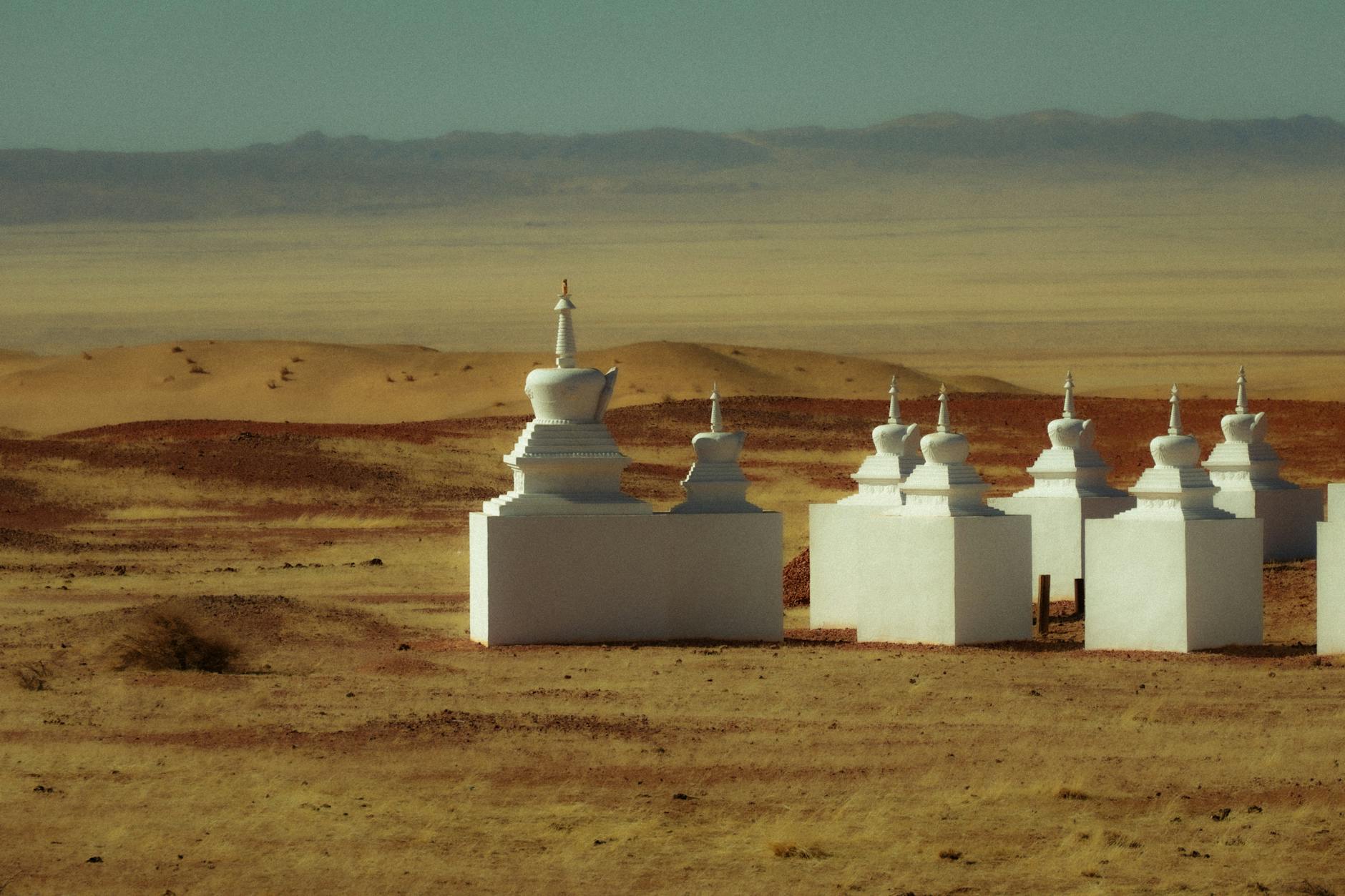 Vast Mongolian grasslands under blue sky where sustainable cashmere goats graze