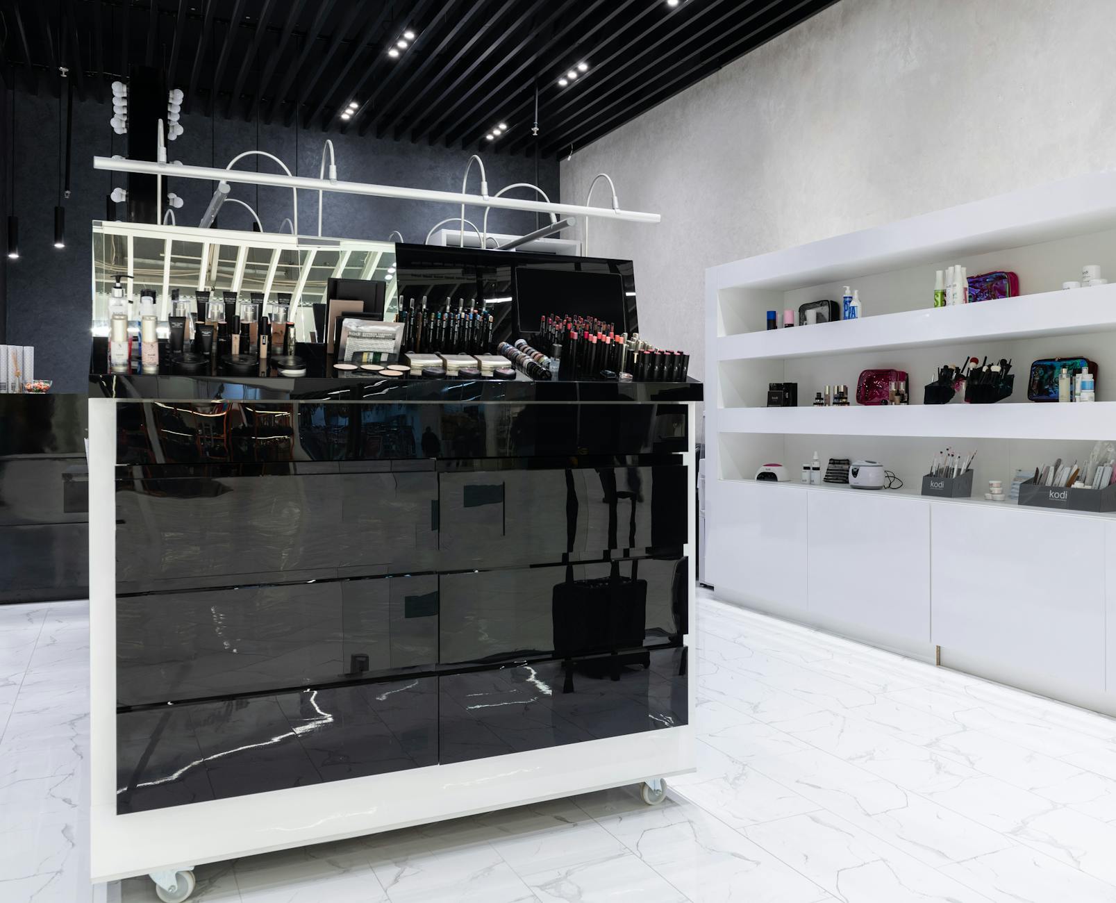 Elegant high-end clothing boutique with organized racks of designer clothes