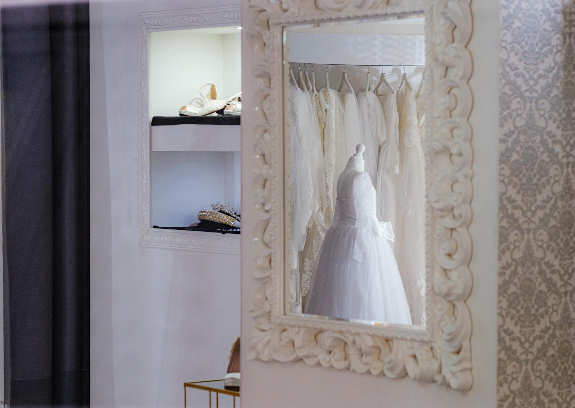 Interior of upscale fashion boutique with clothing displays