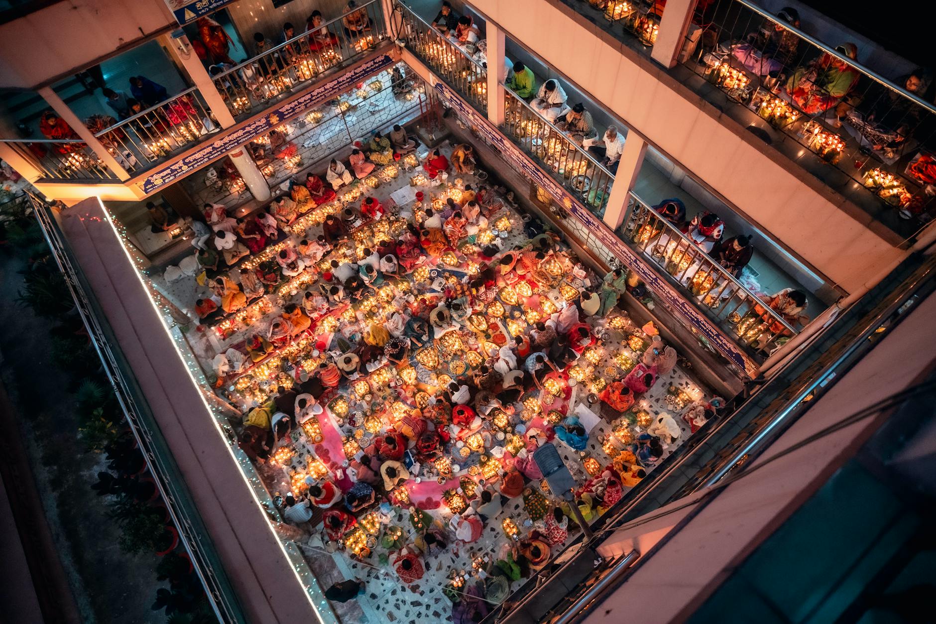 People gathered in indoor community space for cultural event
