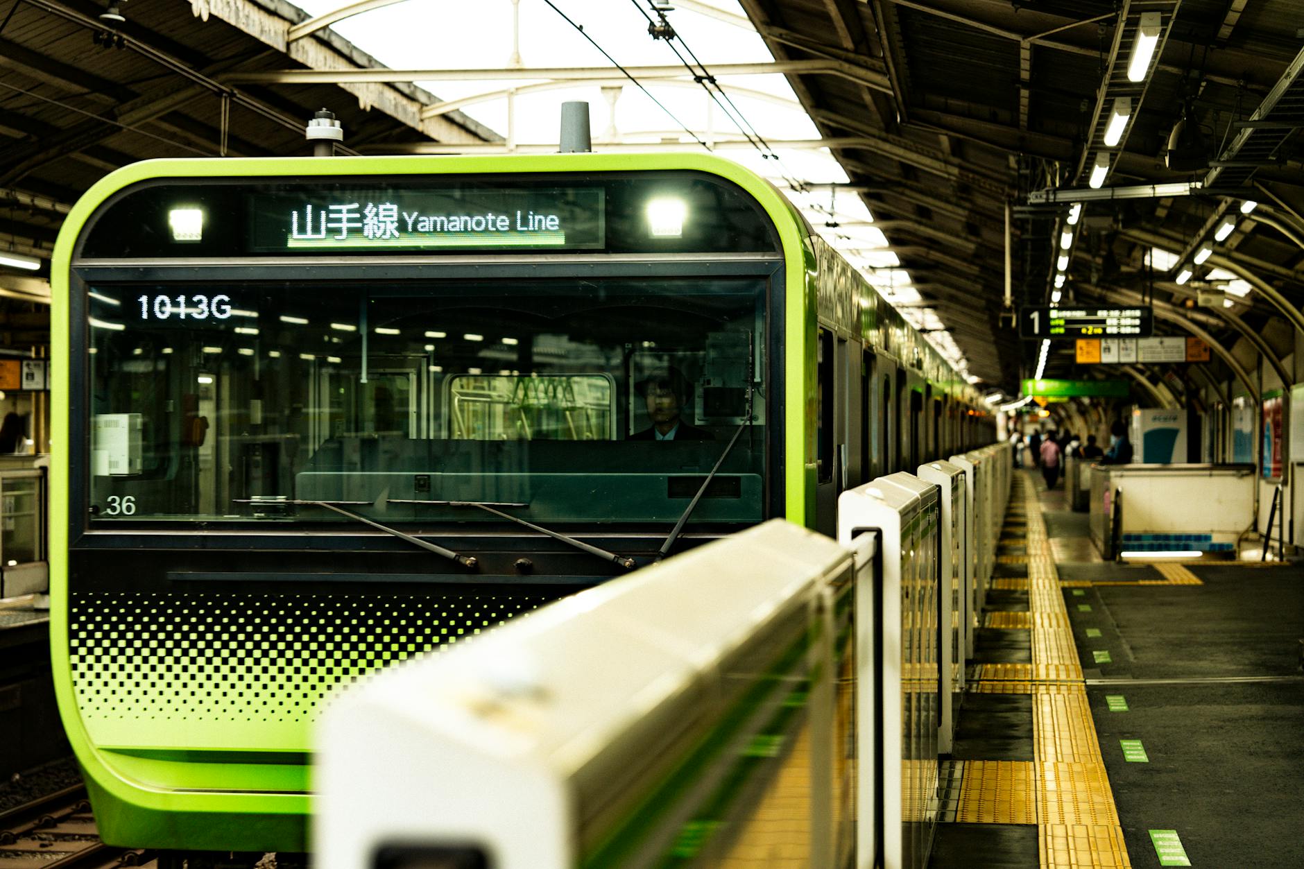 Tokyo metro station interior with modern signage and clean architectural design