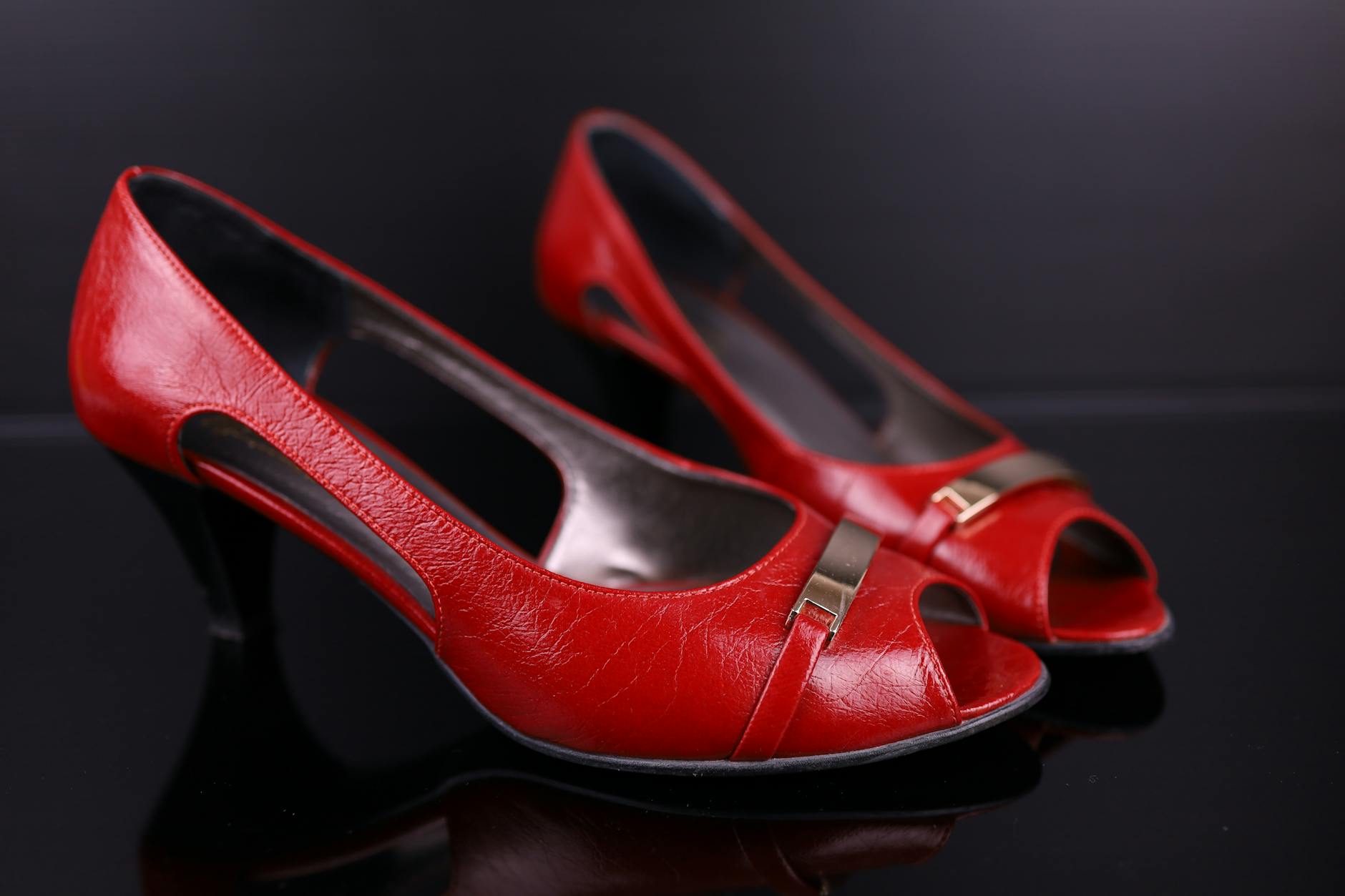 Elegant high heel shoes displayed on professional background