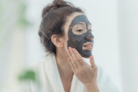 Luxury skincare mask being applied to face