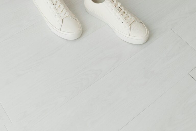Todd Snyder and Sperry Tap Mister Rogers for a Three-Piece Drop White canvas low-top sneakers on a clean surface