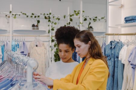 Interior of a mass-market retail clothing store with folded garments on display