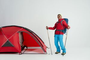 Collection of outdoor gear and equipment including backpacks and technical apparel