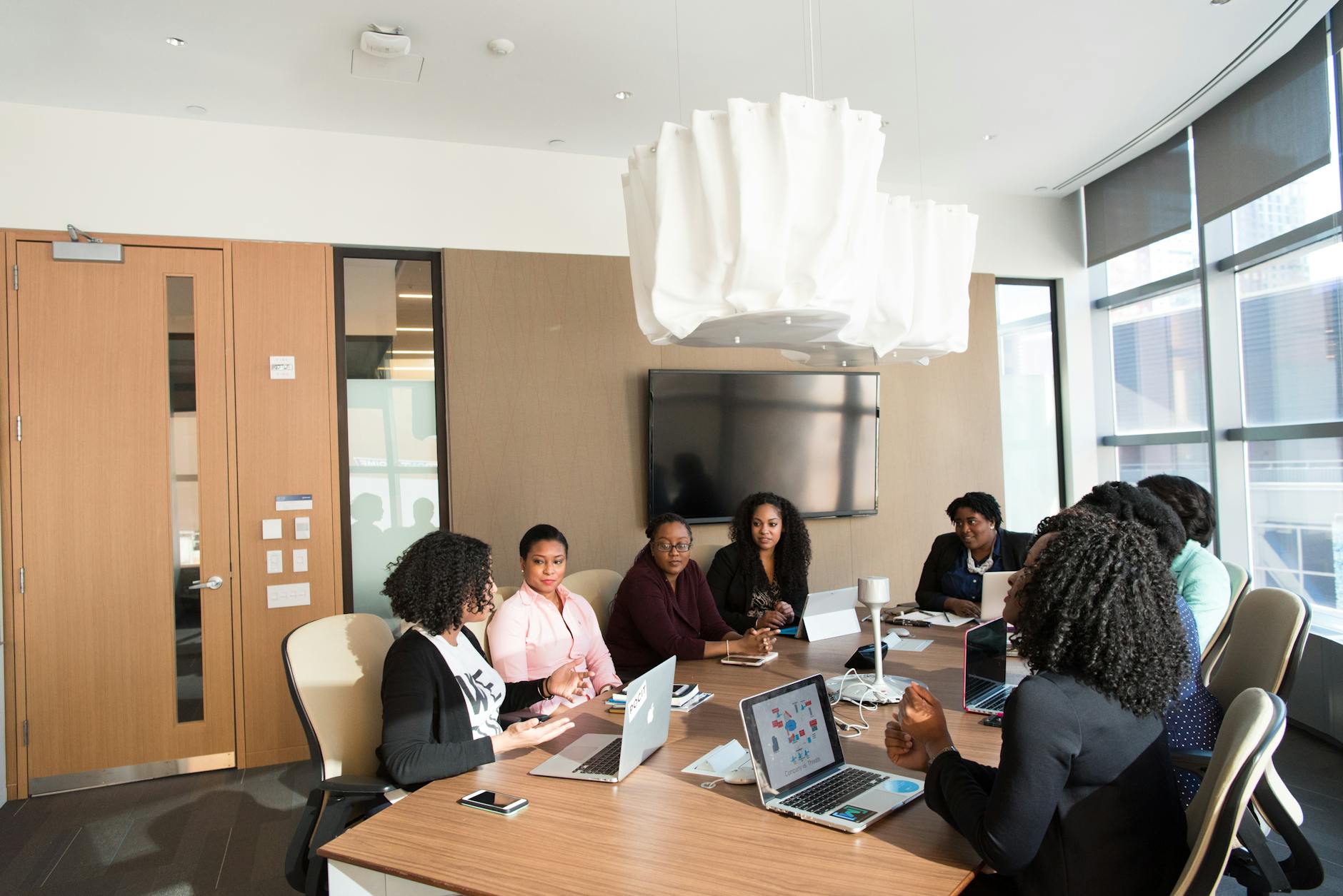 Corporate executives in boardroom meeting