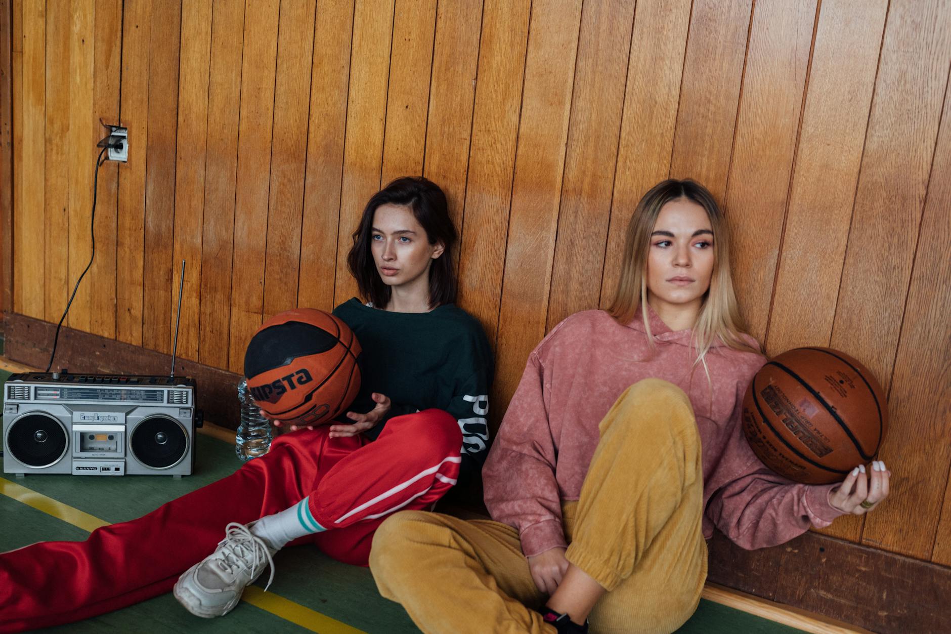 Female basketball players in action during professional game