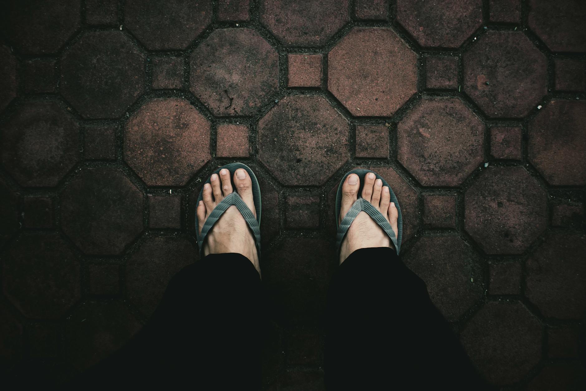 Woman's feet in summer sandals showing smooth, well-maintained skin