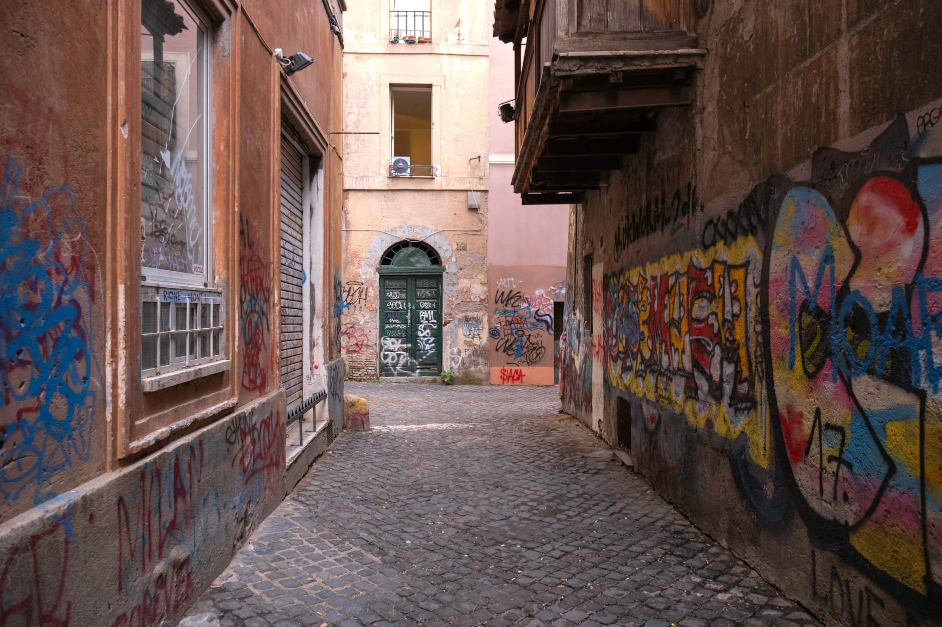 Ancient Roman cobblestone street with historic architecture