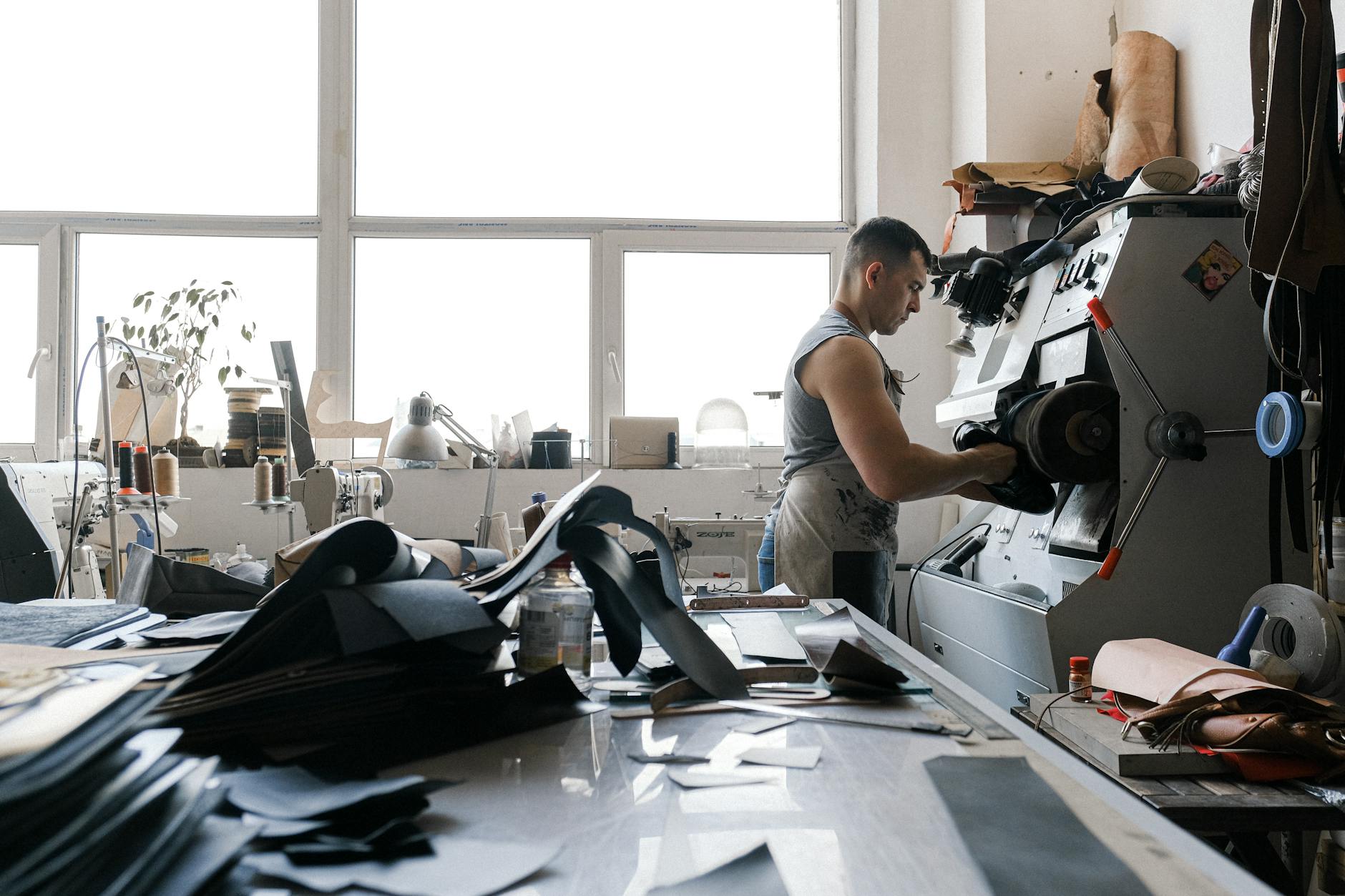 Shoe designer working on footwear sketches and prototypes