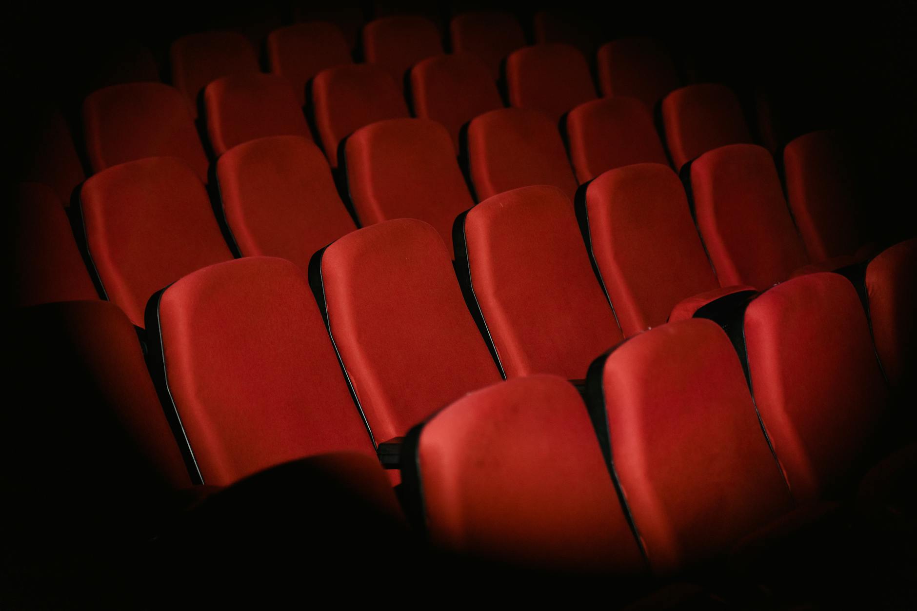 Moody theatrical lighting creating dramatic shadows and atmosphere