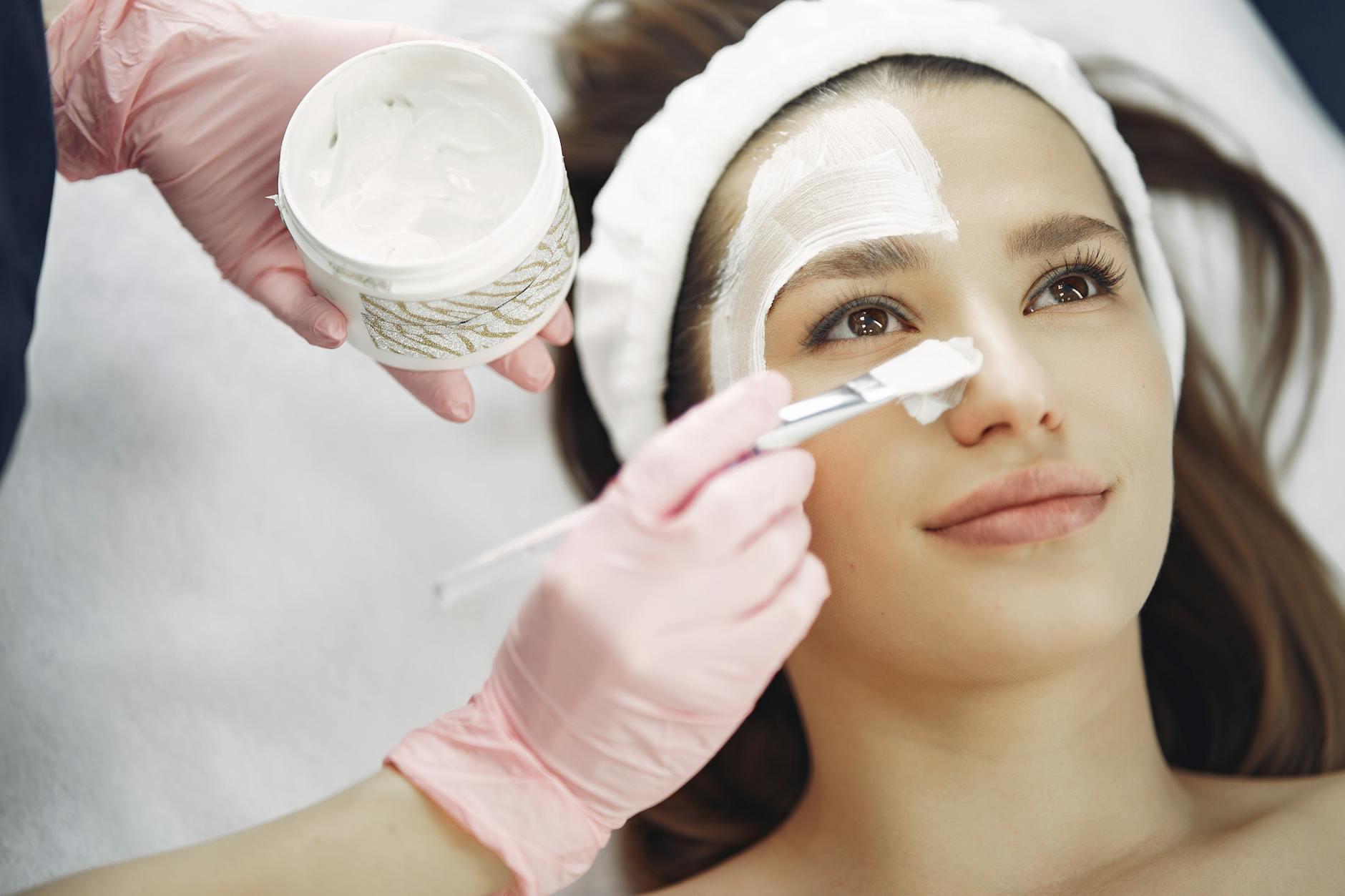 Professional skincare treatment pads on marble surface