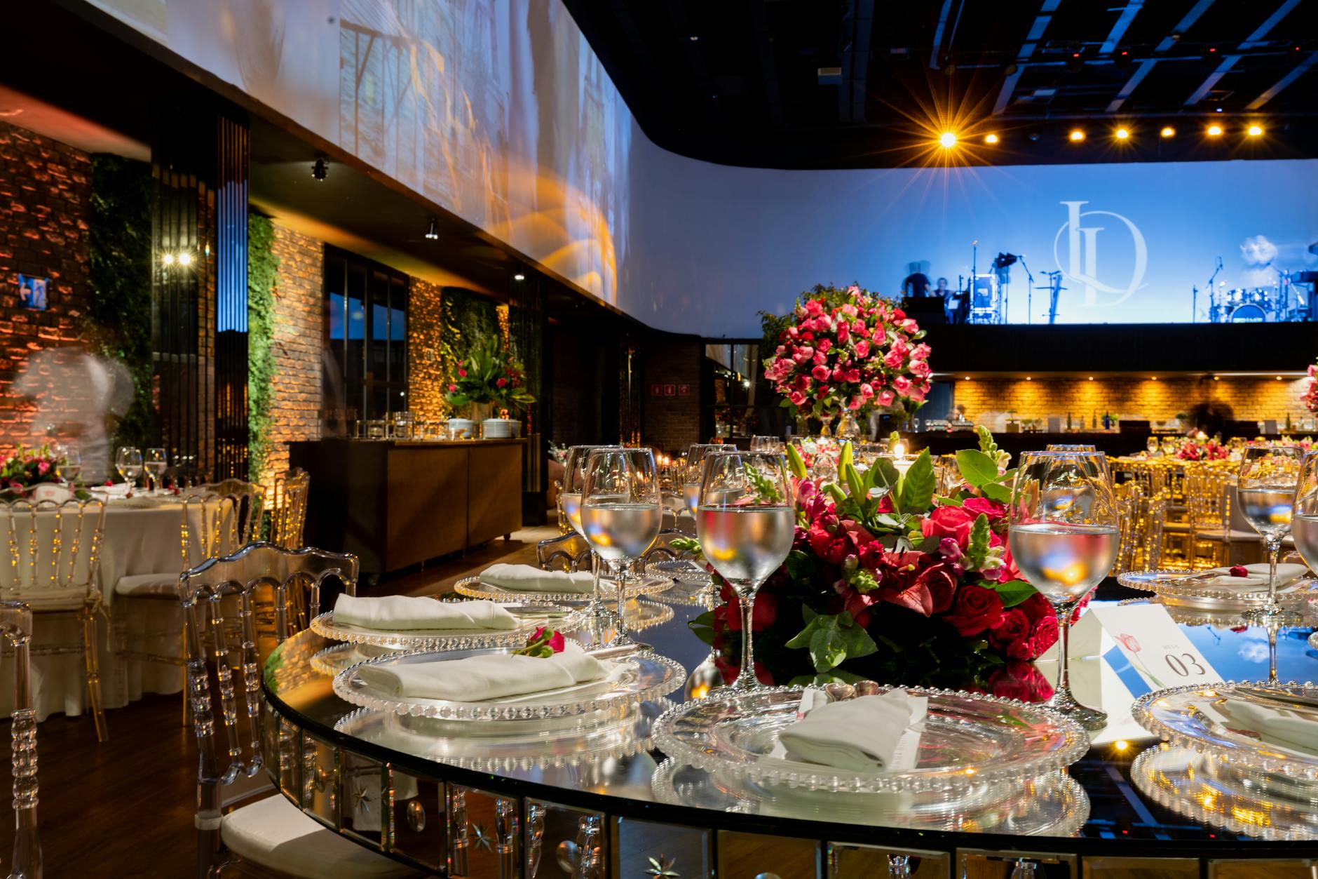 Elegantly dressed guests at a formal philanthropic fundraising gala