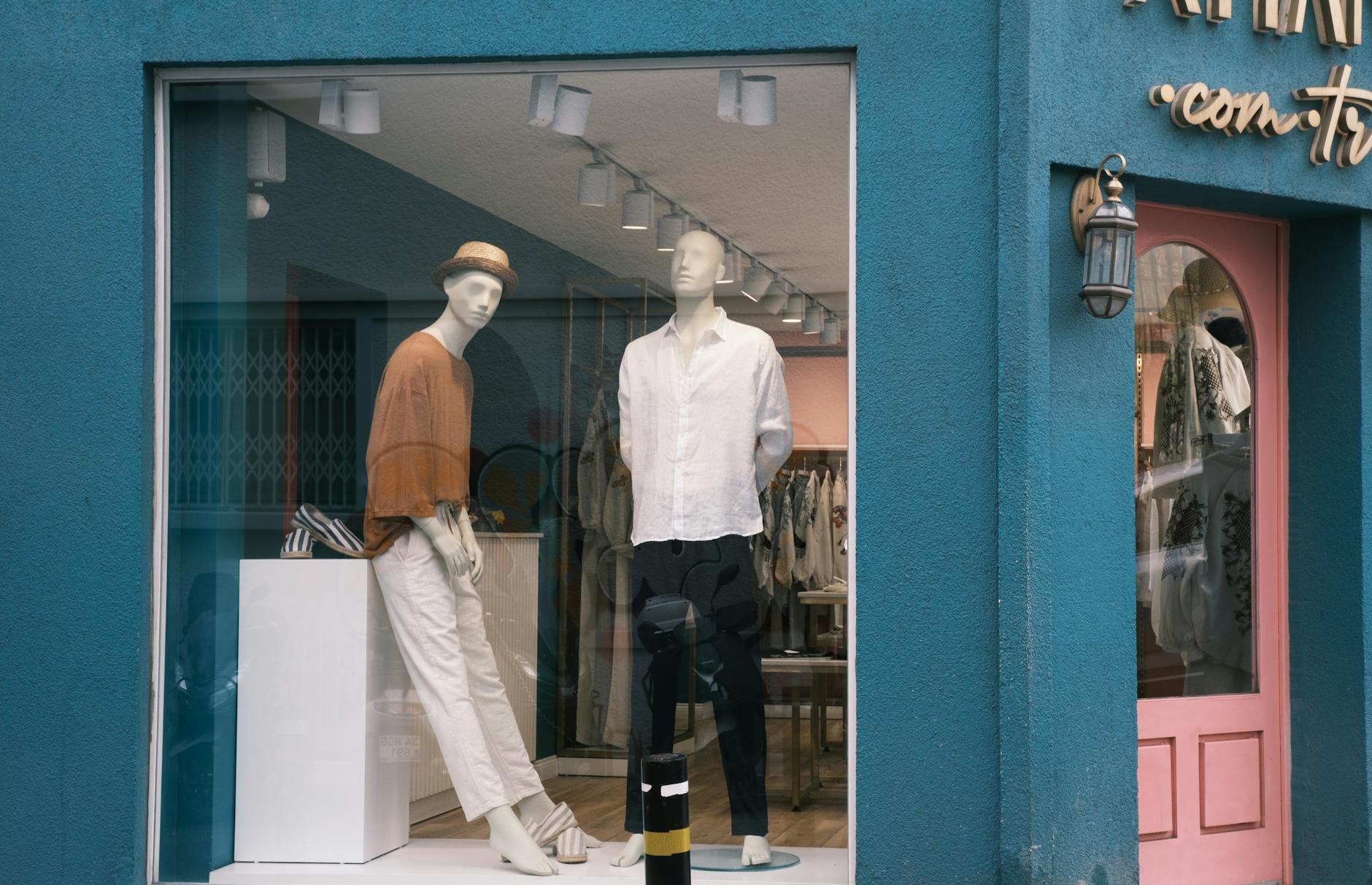 Colorful apparel merchandise arranged on retail shelving