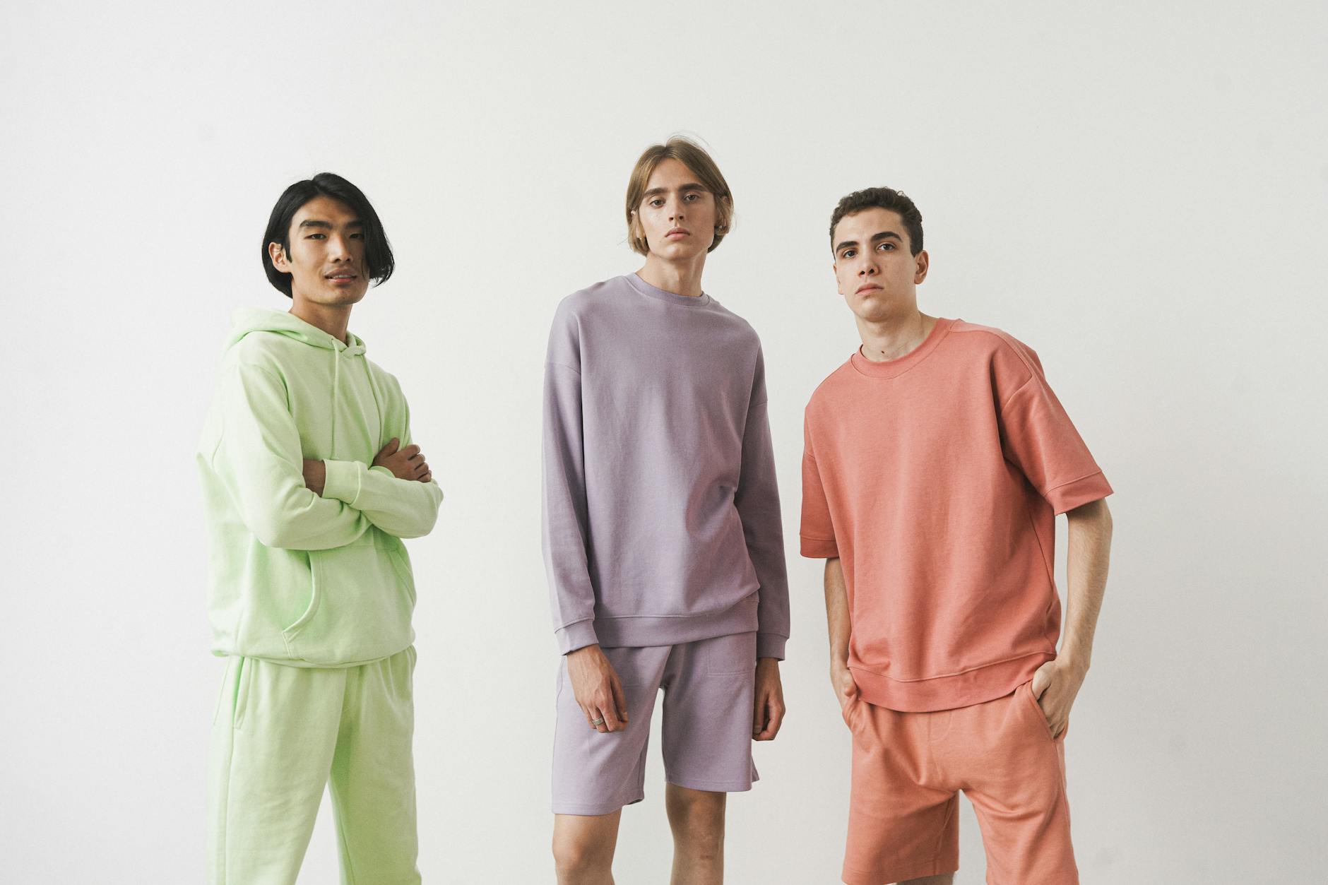 Casual summer clothing items including hoodies and shorts displayed together