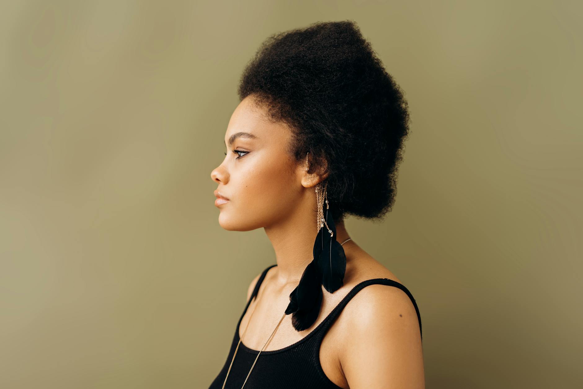 Model with full, bouncy hair showing natural volume and movement