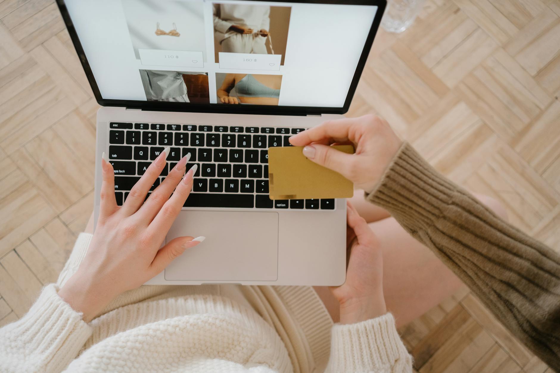 Woman browsing beauty products on laptop for online shopping