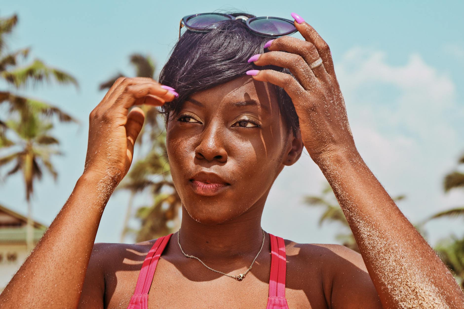 Woman with glowing skin on shoulders and arms in warm weather