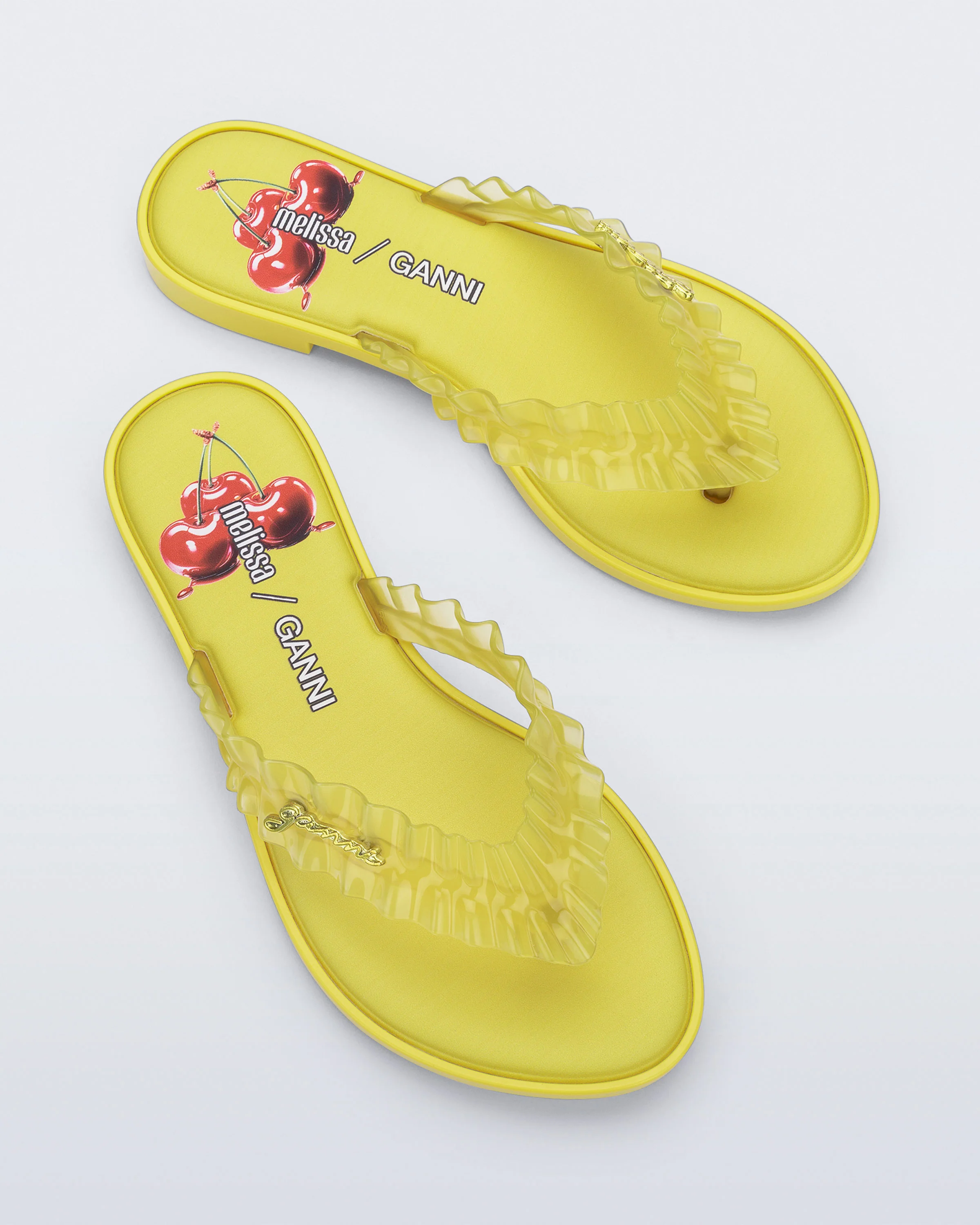 Various summer shoes arranged in bright lighting
