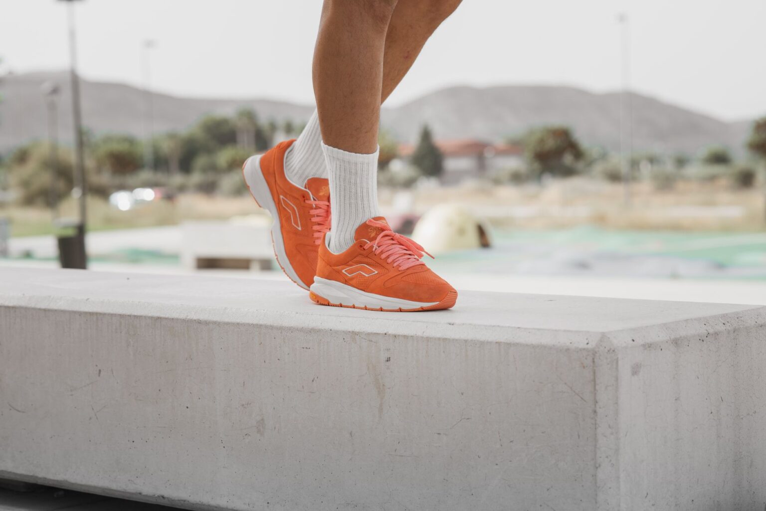 Close-up of bold colorful athletic sneakers displayed on a clean surface