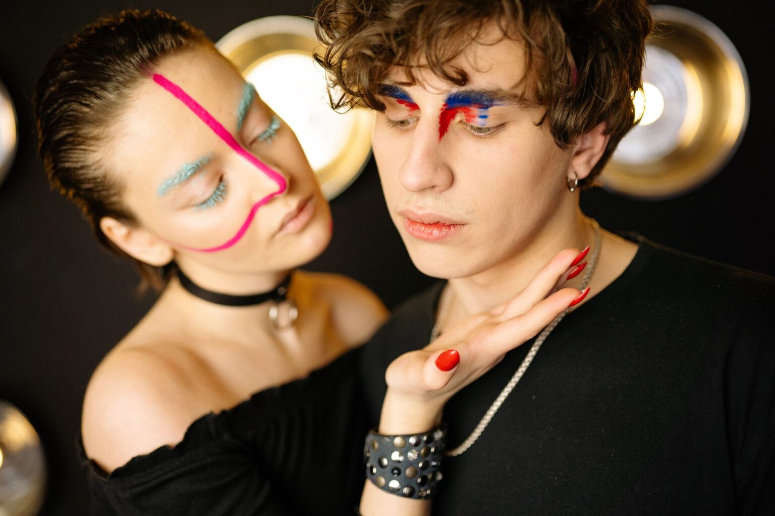 Katseye Built a Global Fan Base. The Bruises Were Part of the Deal. Close-up of bold stage makeup on a young woman performer under bright lights