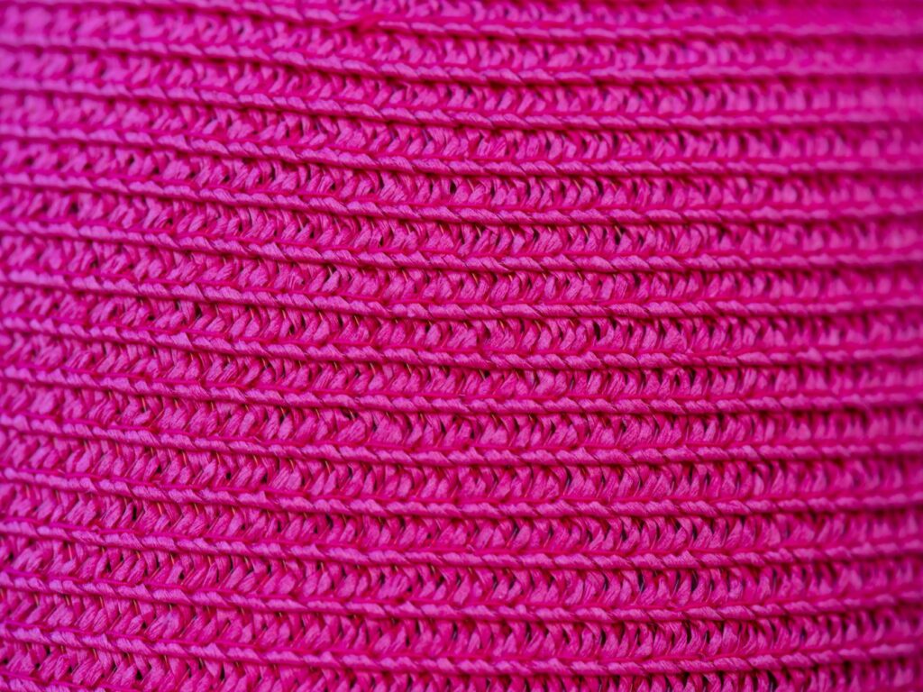 Close-up of a knit-upper athletic sneaker showing woven textile construction