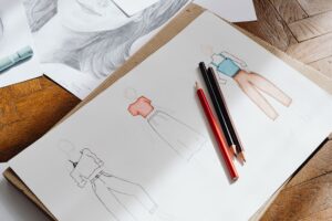 183 Unpublished Yamamoto Sketches Surface in New Thames & Hudson Book Close-up of fashion design sketches on paper showing garment silhouettes