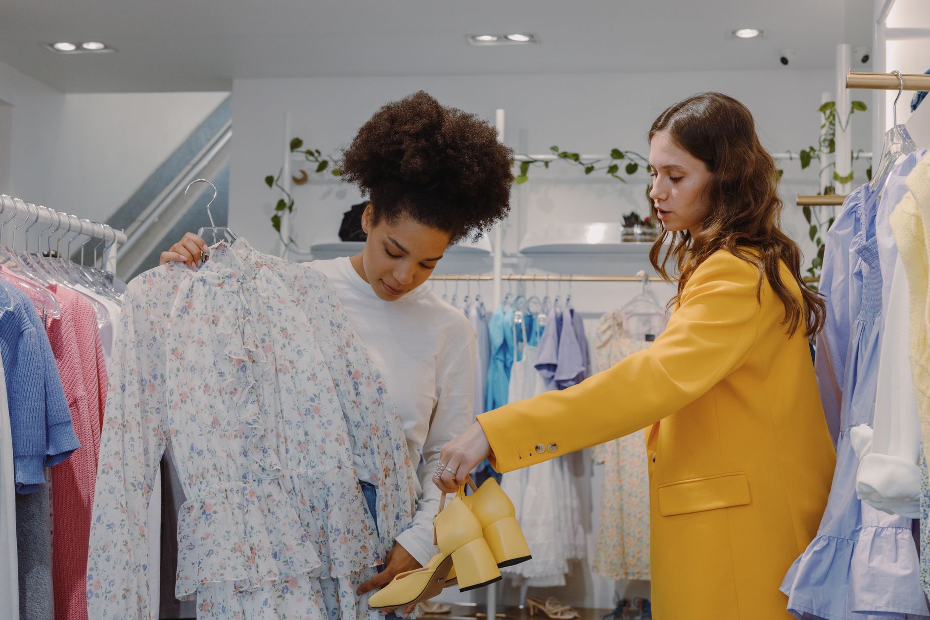 Women's apparel on display in a retail store setting