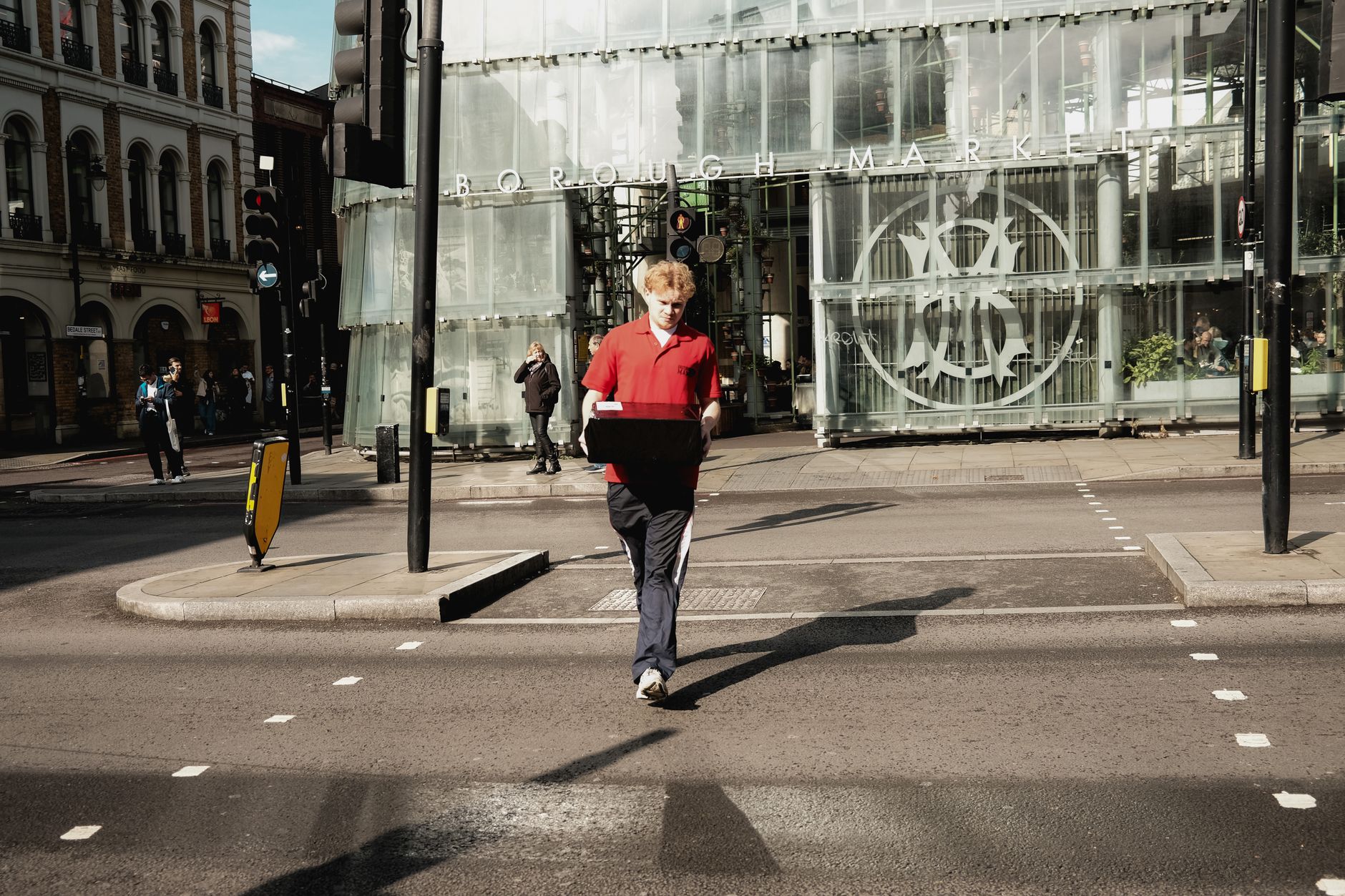 Street-level fashion scene in a British city outside London