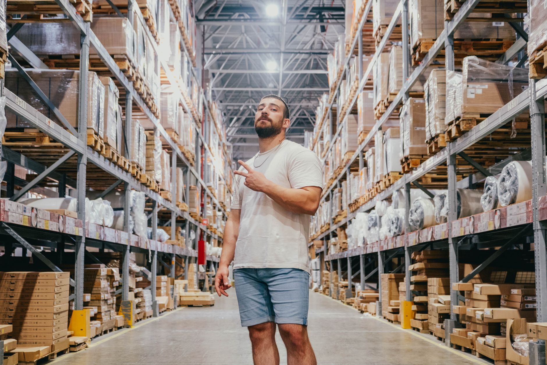Rows of boxed shoes stacked in a footwear distribution warehouse