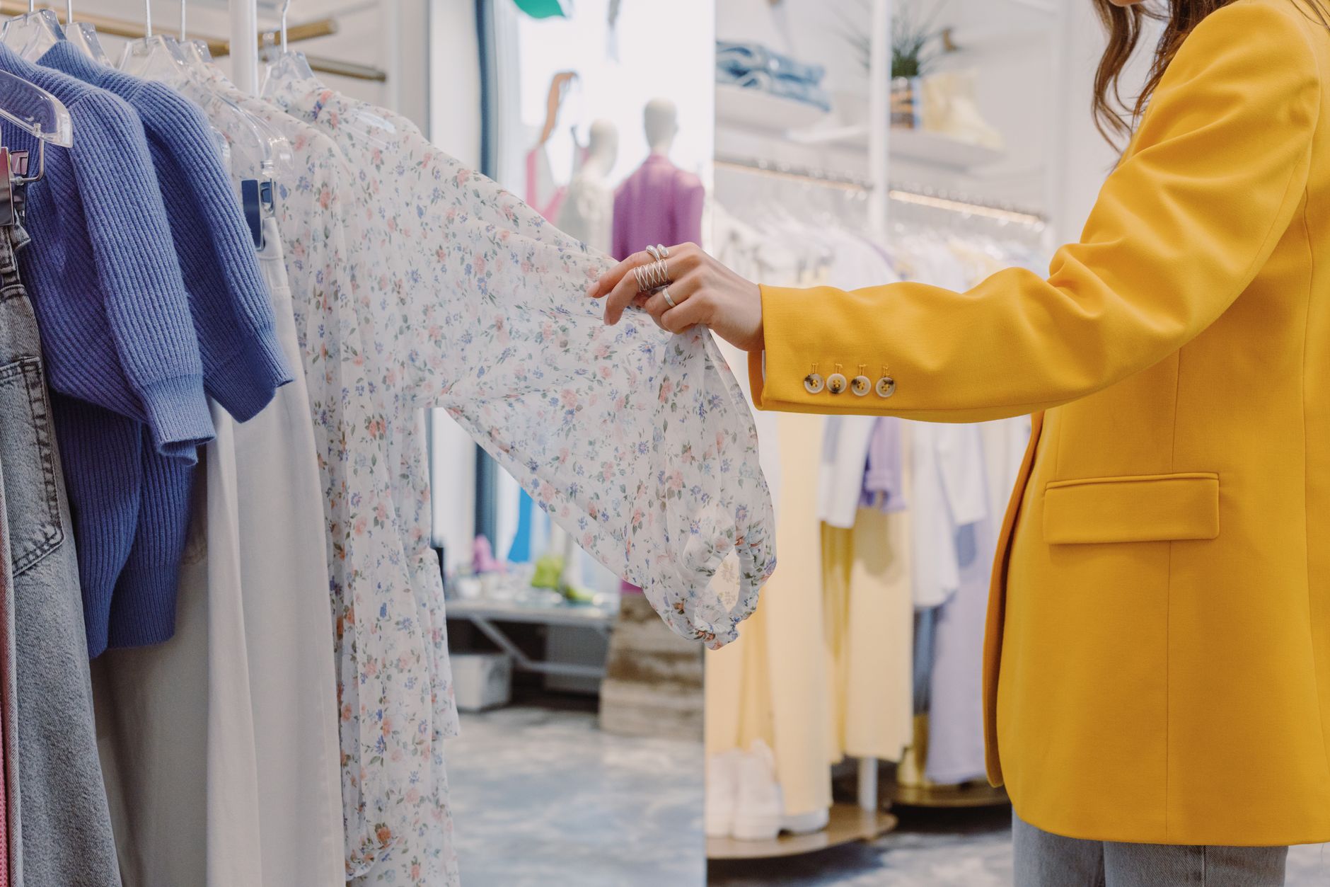 High-end fashion retail environment reflecting brand acquisition stakes