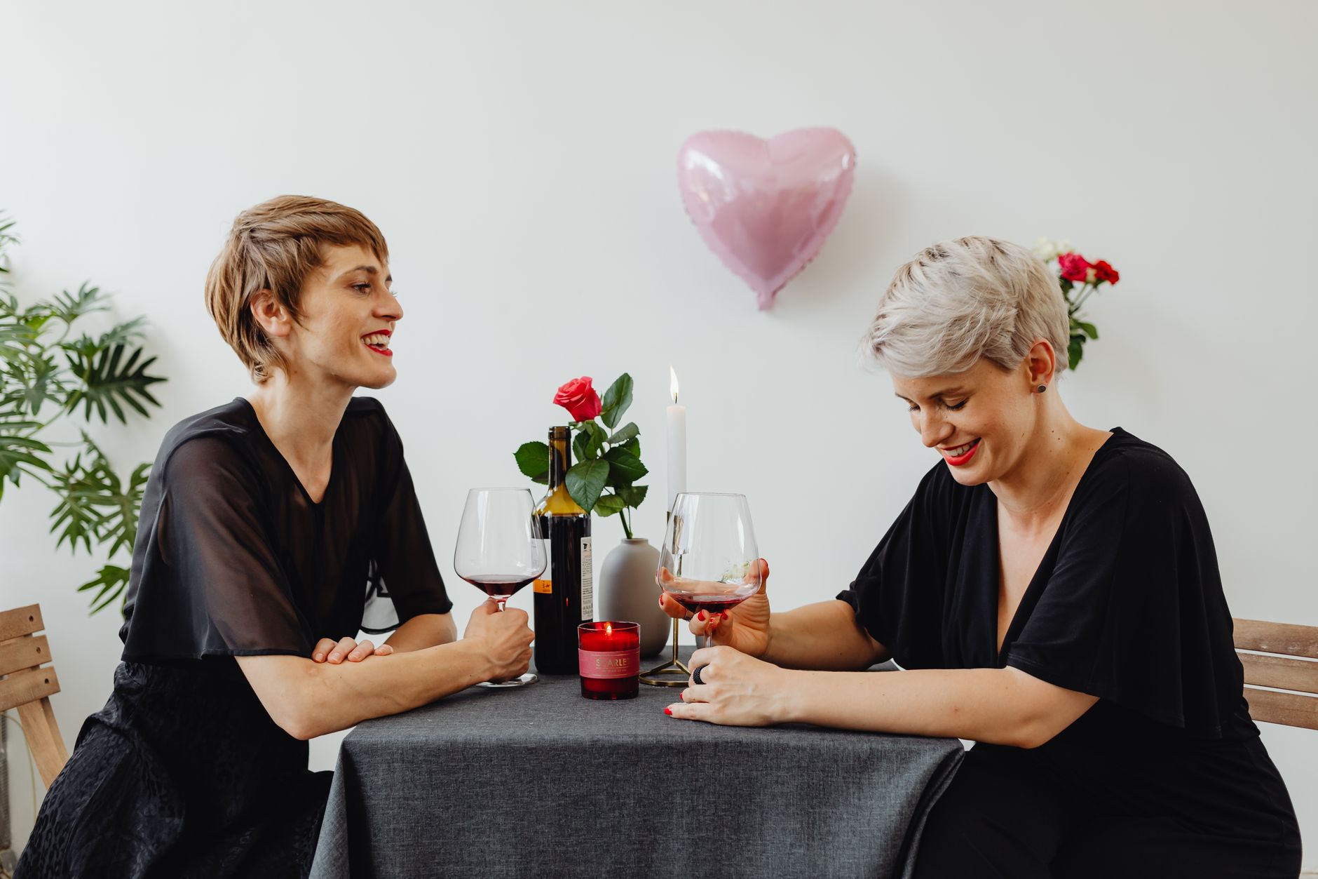 A woman with a sculptural heart-shaped haircut, high-fashion styling reference