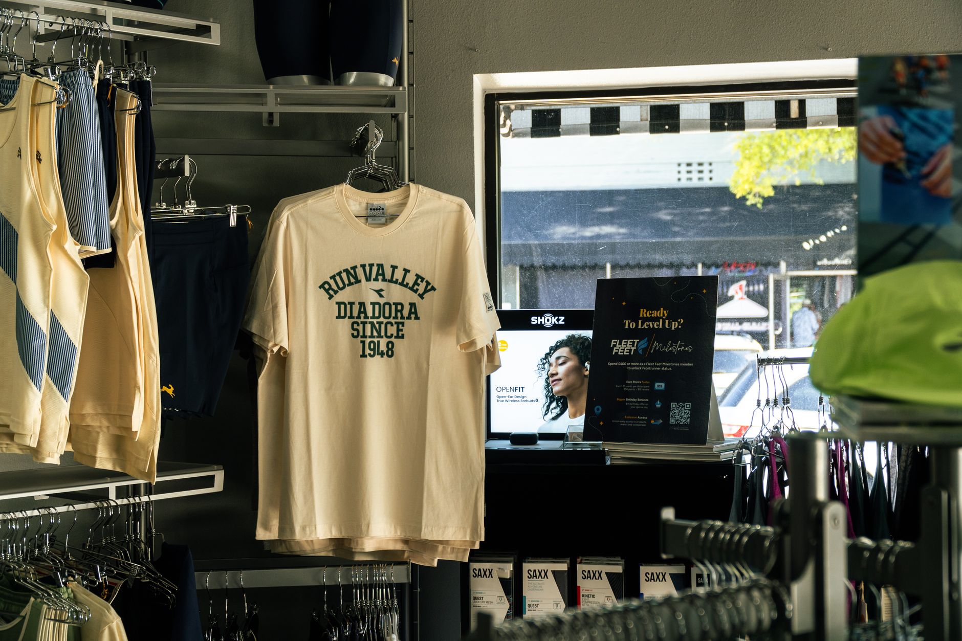 Interior of a sportswear retail store with footwear wall display