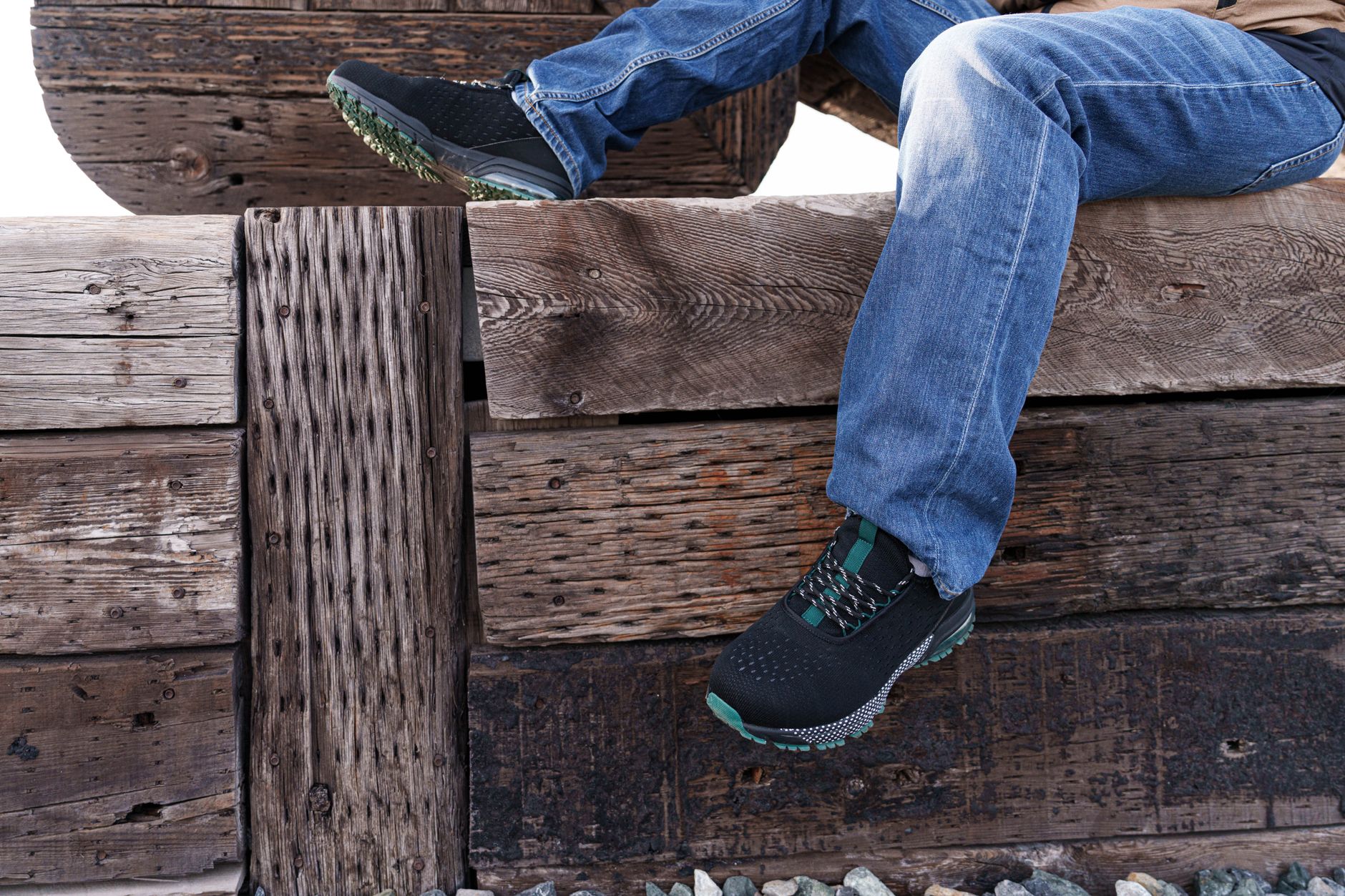 Close-up of a black sneaker with textured fur material on the upper