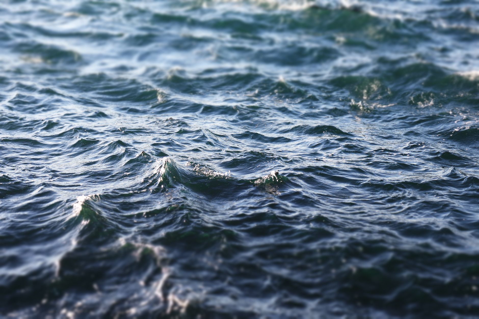 Calm ocean waves at dusk, symbolizing the water-sign energy of the Pisces lunar eclipse week